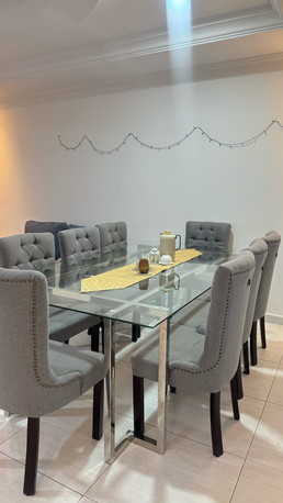 SAR 1750,  Dining Table With 8 Chairs. Glass Top & Fabric Chairs