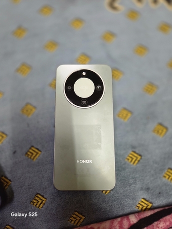 SAR 1100,  Honor X9D photo 2