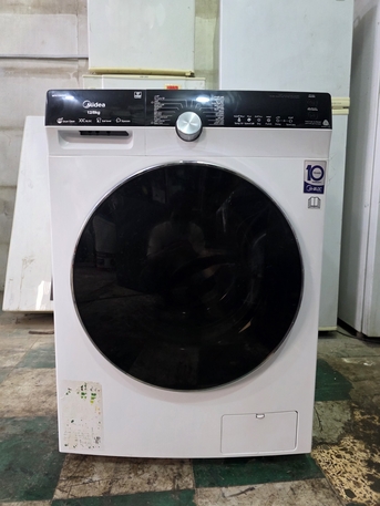 SAR 1200,  Midea 12KG Washing Machine With Steam Drying – Same As New photo 1