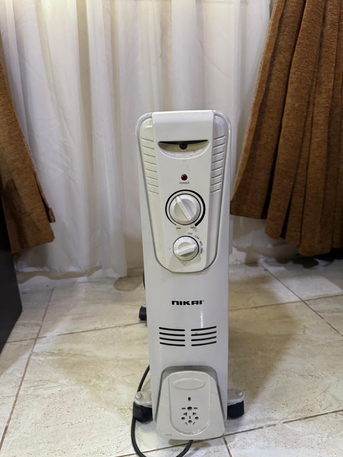 SAR 100,  Room Heater Oil Type photo 1